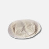 Stór, kringlótt, beige ThermoQuilt hundasett með teppuðu efsta lagi og örlítið innfelldri miðju, fullkomin sem ofnæmisvaldandi hundasett. Sett á hvítan bakgrunn.